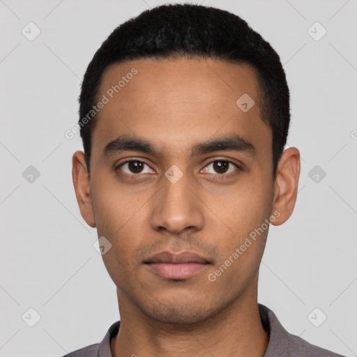 Neutral latino young-adult male with short  black hair and brown eyes