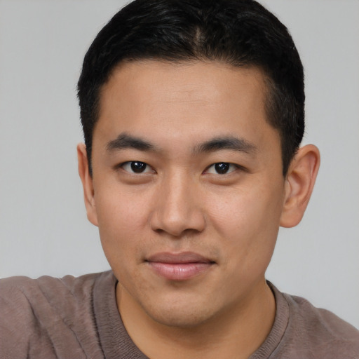 Neutral asian young-adult male with short  brown hair and brown eyes
