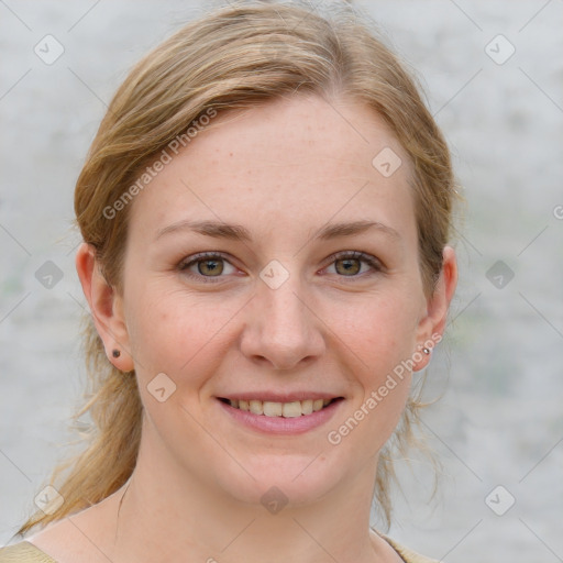 Joyful white young-adult female with medium  brown hair and blue eyes