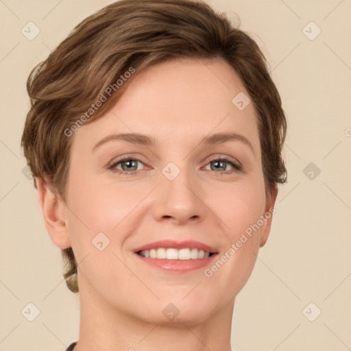 Joyful white young-adult female with short  brown hair and grey eyes