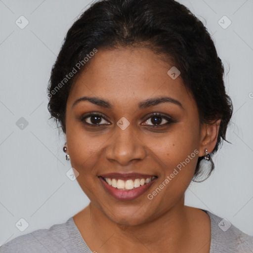 Joyful black young-adult female with medium  brown hair and brown eyes