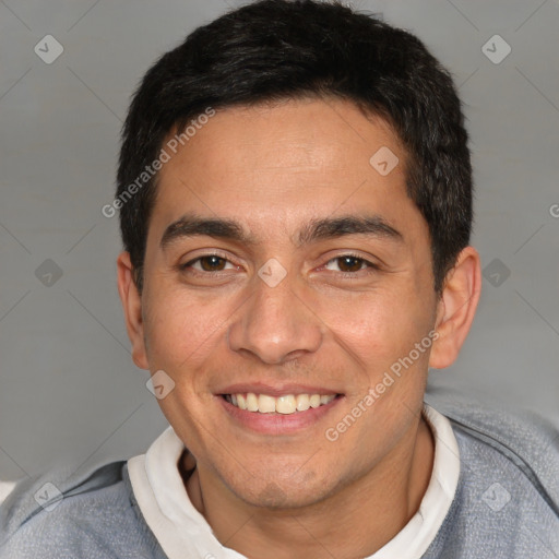 Joyful white young-adult male with short  black hair and brown eyes