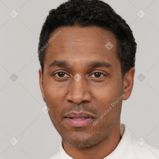 Neutral latino adult male with short  black hair and brown eyes