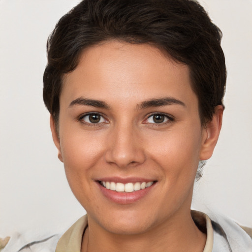 Joyful white young-adult female with short  brown hair and brown eyes