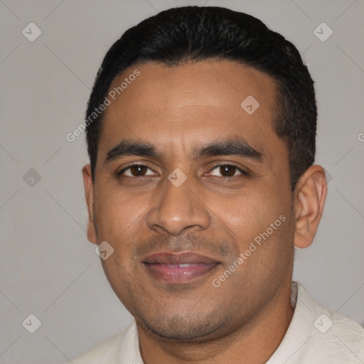 Joyful latino young-adult male with short  black hair and brown eyes