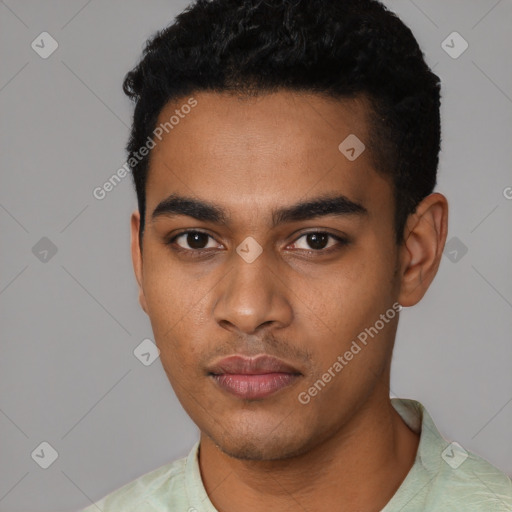 Neutral latino young-adult male with short  black hair and brown eyes