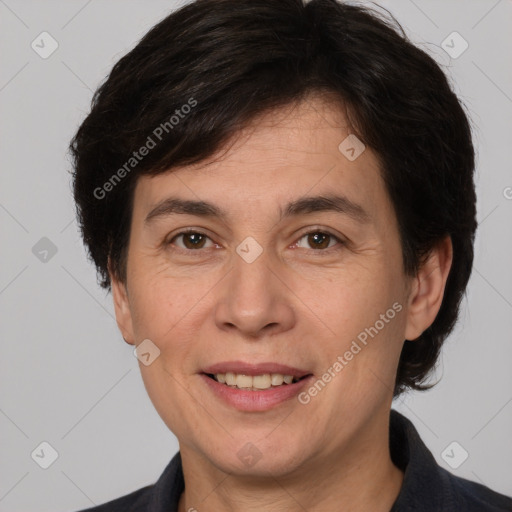 Joyful white adult female with short  brown hair and brown eyes