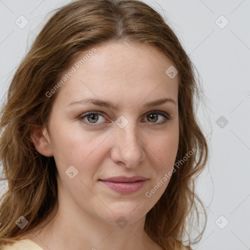 Joyful white young-adult female with long  brown hair and green eyes