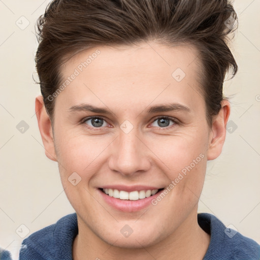 Joyful white young-adult female with short  brown hair and grey eyes