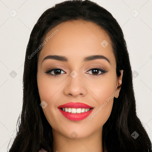 Joyful latino young-adult female with long  black hair and brown eyes