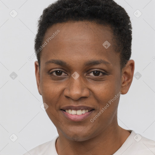 Joyful black young-adult female with short  black hair and brown eyes