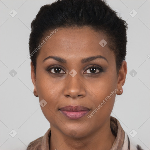 Joyful black young-adult female with short  brown hair and brown eyes