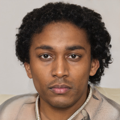 Neutral black young-adult male with short  brown hair and brown eyes