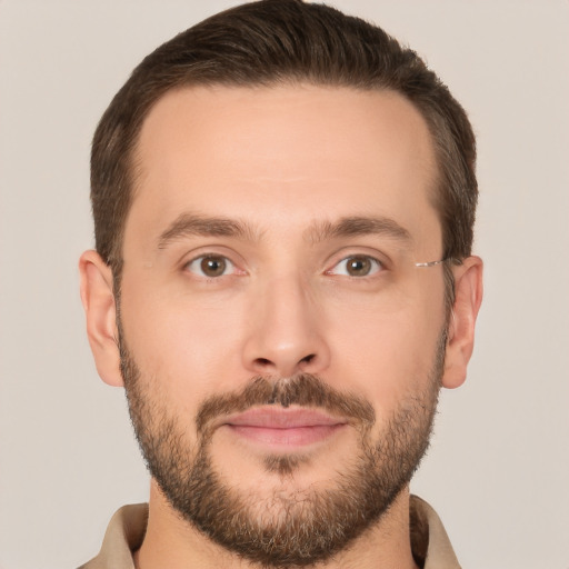 Joyful white young-adult male with short  brown hair and brown eyes