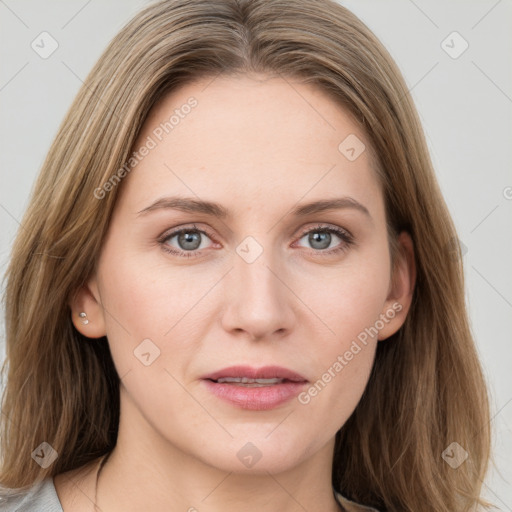 Joyful white young-adult female with medium  brown hair and blue eyes