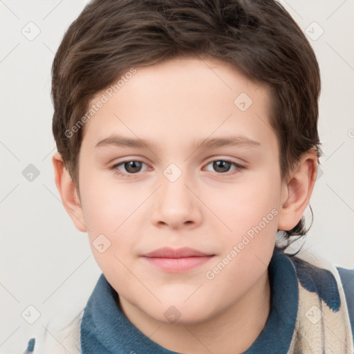 Joyful white child male with short  brown hair and brown eyes