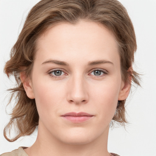 Neutral white young-adult female with medium  brown hair and blue eyes