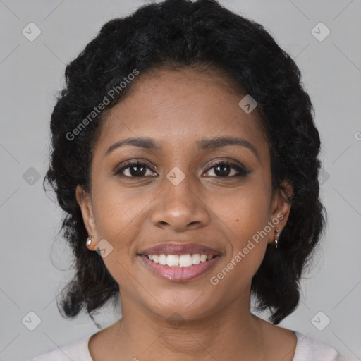 Joyful black young-adult female with medium  black hair and brown eyes