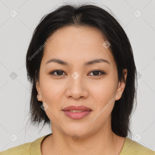 Joyful latino young-adult female with medium  brown hair and brown eyes