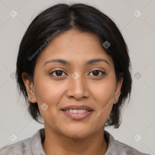 Joyful latino young-adult female with medium  brown hair and brown eyes