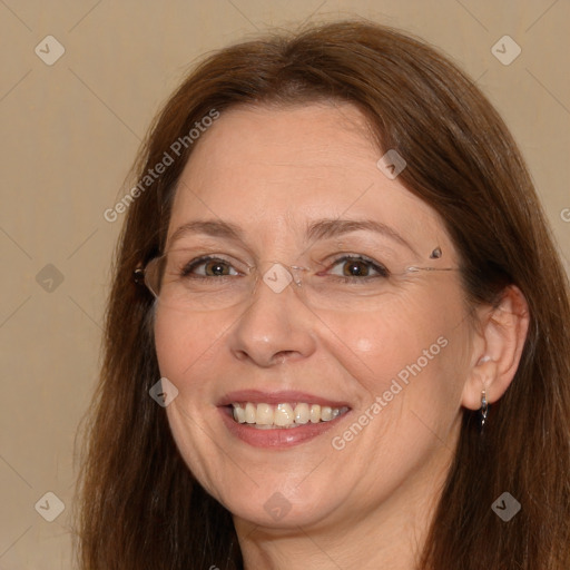 Joyful white adult female with long  brown hair and brown eyes