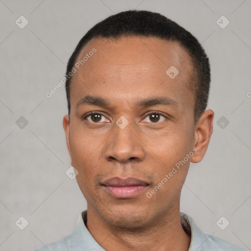 Neutral latino adult male with short  black hair and brown eyes