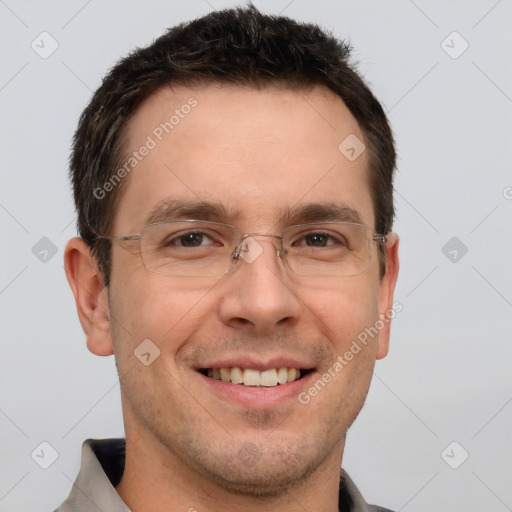 Joyful white adult male with short  brown hair and brown eyes