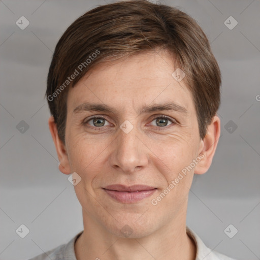 Joyful white adult male with short  brown hair and grey eyes