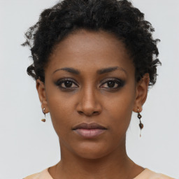 Neutral black young-adult female with short  brown hair and brown eyes