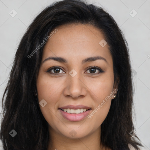 Joyful latino young-adult female with long  brown hair and brown eyes