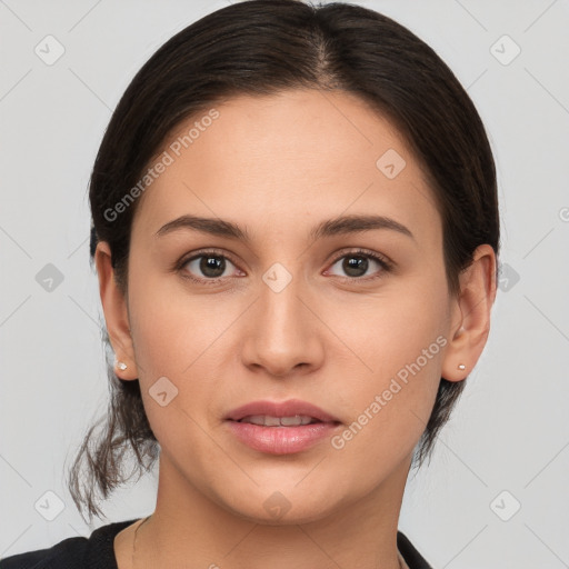 Joyful white young-adult female with medium  brown hair and brown eyes