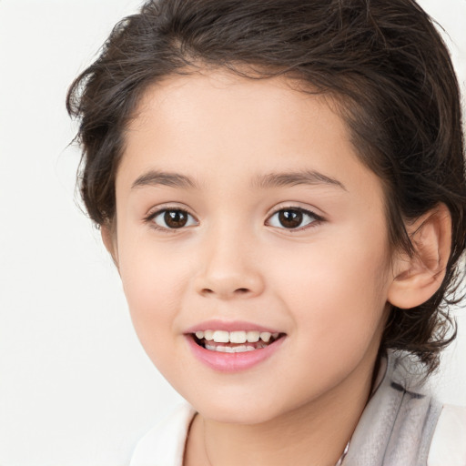 Joyful white child female with medium  brown hair and brown eyes