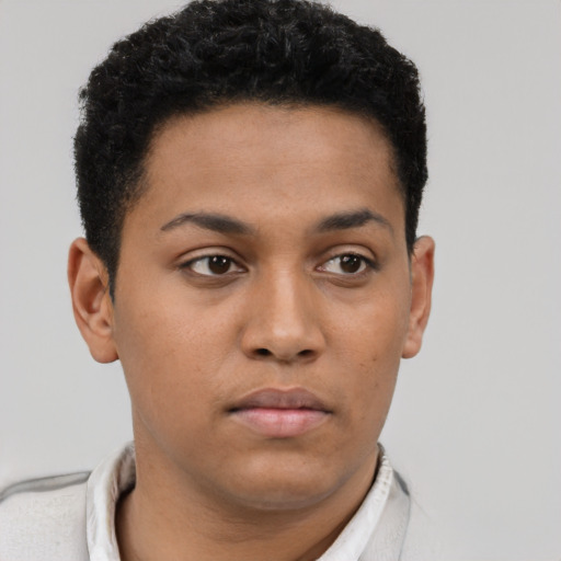 Neutral latino young-adult male with short  brown hair and brown eyes