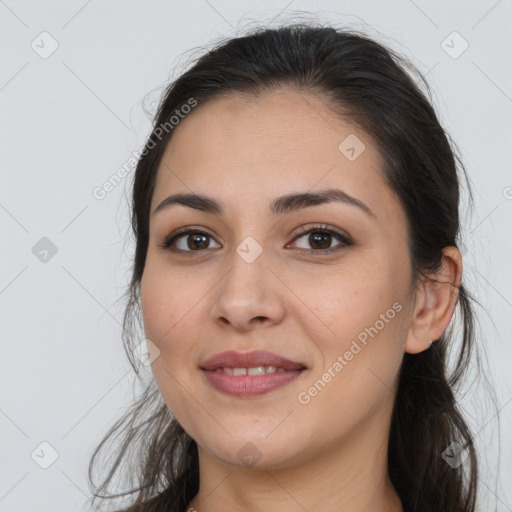 Joyful white young-adult female with long  brown hair and brown eyes