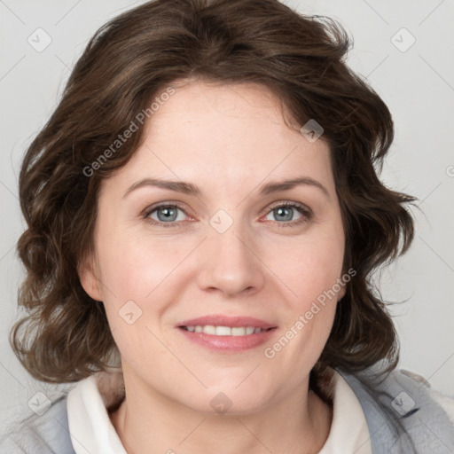 Joyful white young-adult female with medium  brown hair and blue eyes