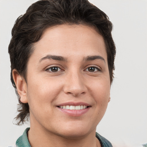 Joyful white young-adult female with short  brown hair and brown eyes