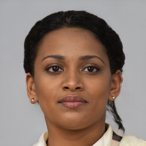 Neutral black young-adult female with short  black hair and brown eyes