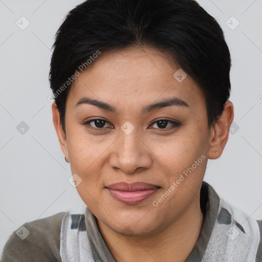 Joyful asian young-adult female with short  brown hair and brown eyes