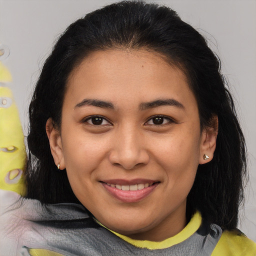 Joyful asian young-adult female with medium  brown hair and brown eyes