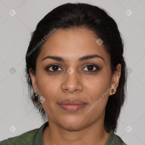 Joyful latino young-adult female with medium  brown hair and brown eyes