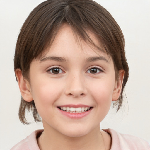 Joyful white child female with medium  brown hair and brown eyes