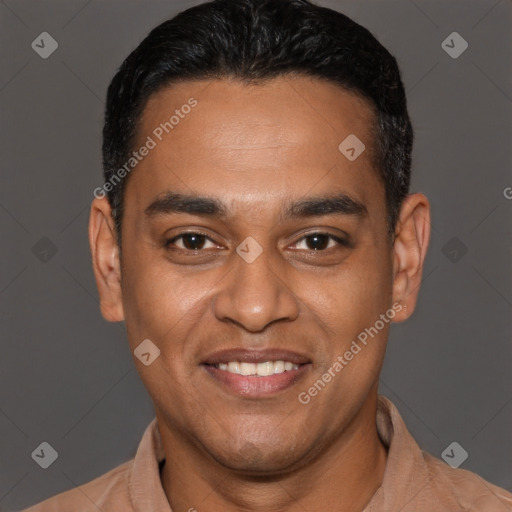 Joyful latino young-adult male with short  black hair and brown eyes