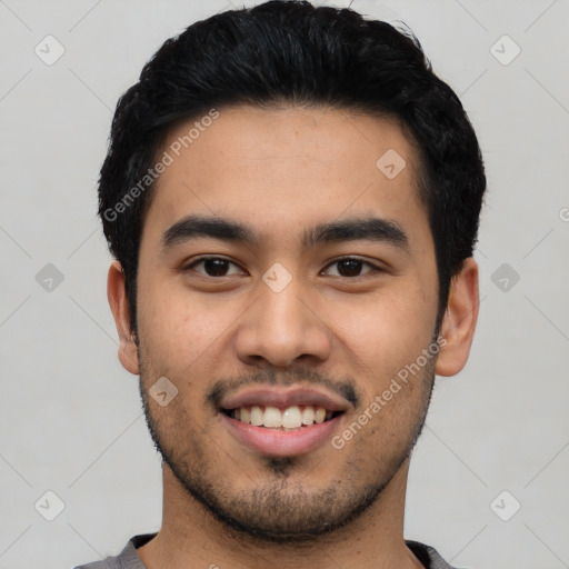 Joyful asian young-adult male with short  black hair and brown eyes