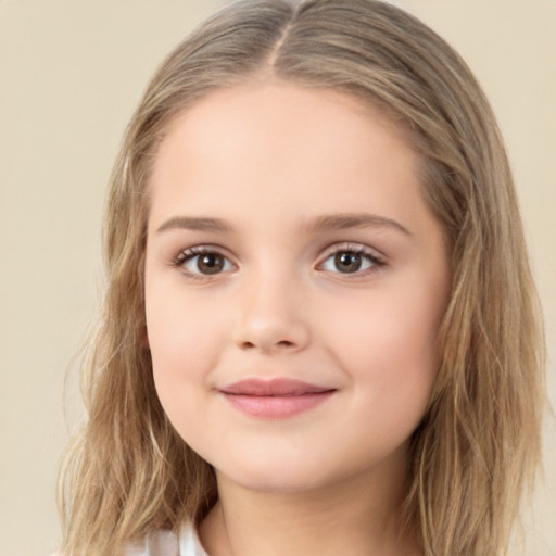 Joyful white child female with long  brown hair and brown eyes