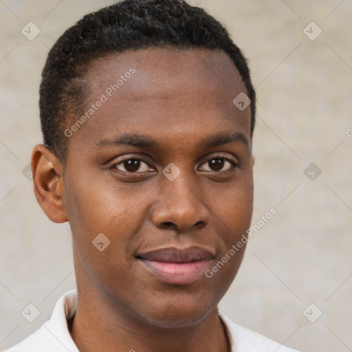 Joyful black young-adult male with short  brown hair and brown eyes