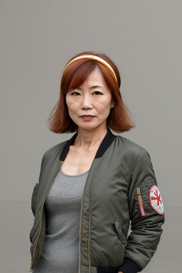 Japanese middle-aged female with  ginger hair