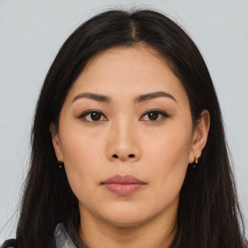 Neutral asian young-adult female with long  brown hair and brown eyes