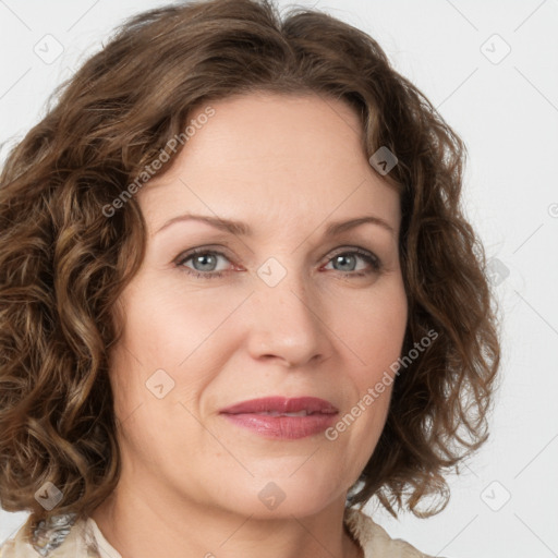 Joyful white young-adult female with medium  brown hair and green eyes