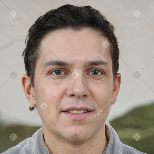 Joyful white adult male with short  brown hair and brown eyes