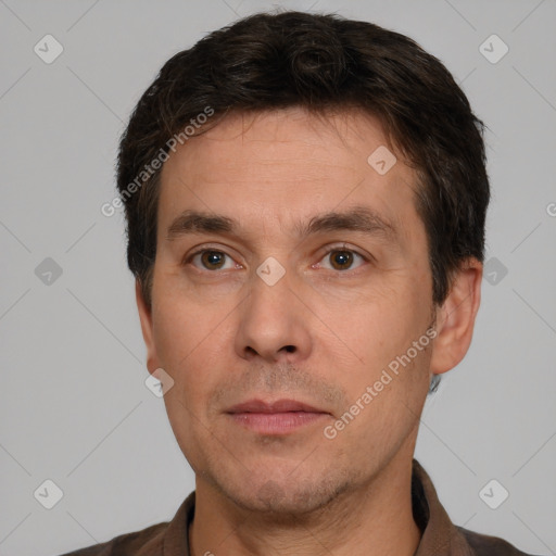 Neutral white adult male with short  brown hair and brown eyes